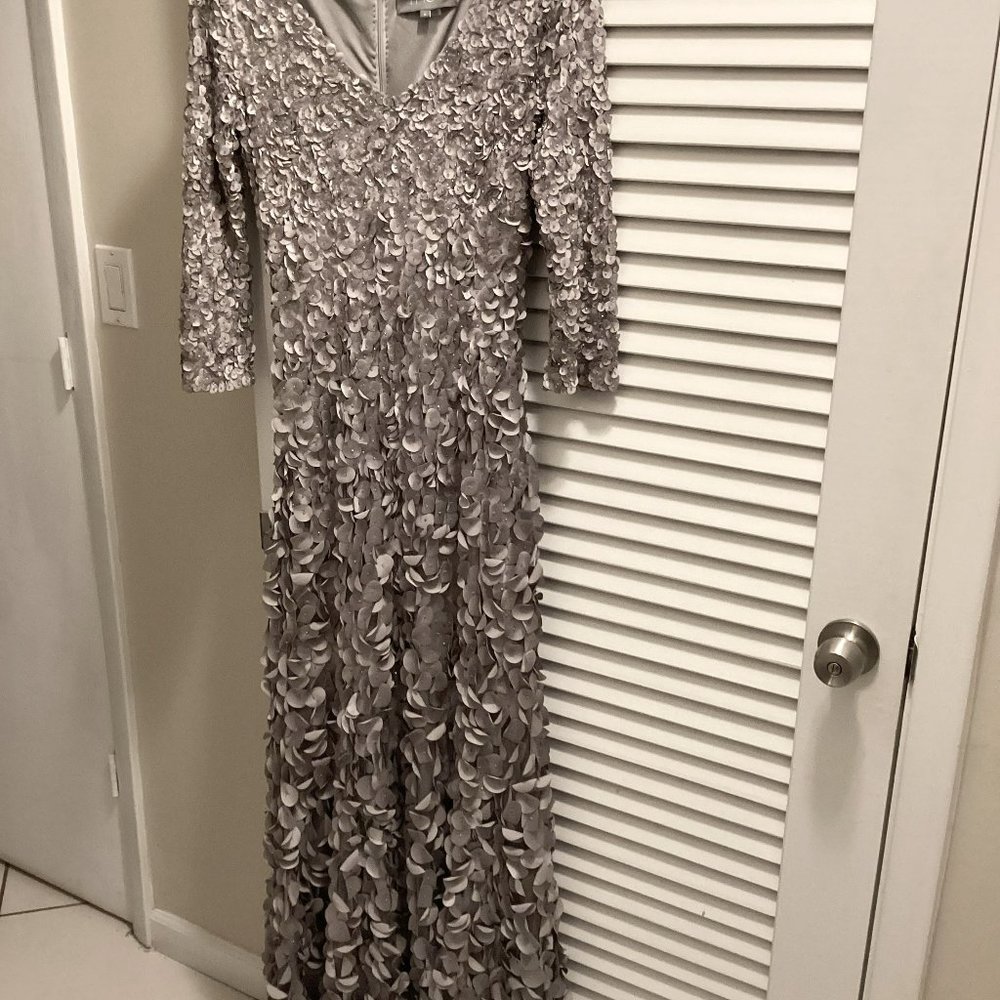 Theia Size 6 gown/mid length sleeve/super comfortable/petal treatment